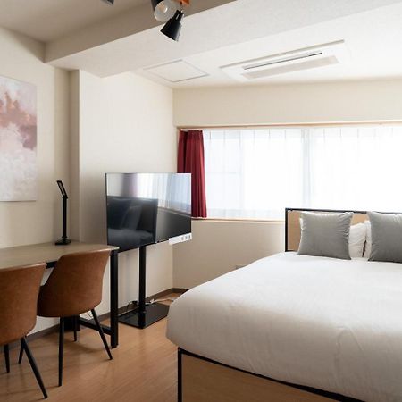 Апартаменти Shinjuku Okada Building Токіо Екстер'єр фото